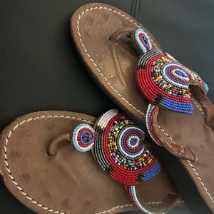 Beautiful vibrant beaded flip flops